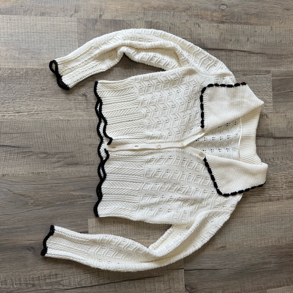 Elegant White Cardigan Sweater with Black Trim